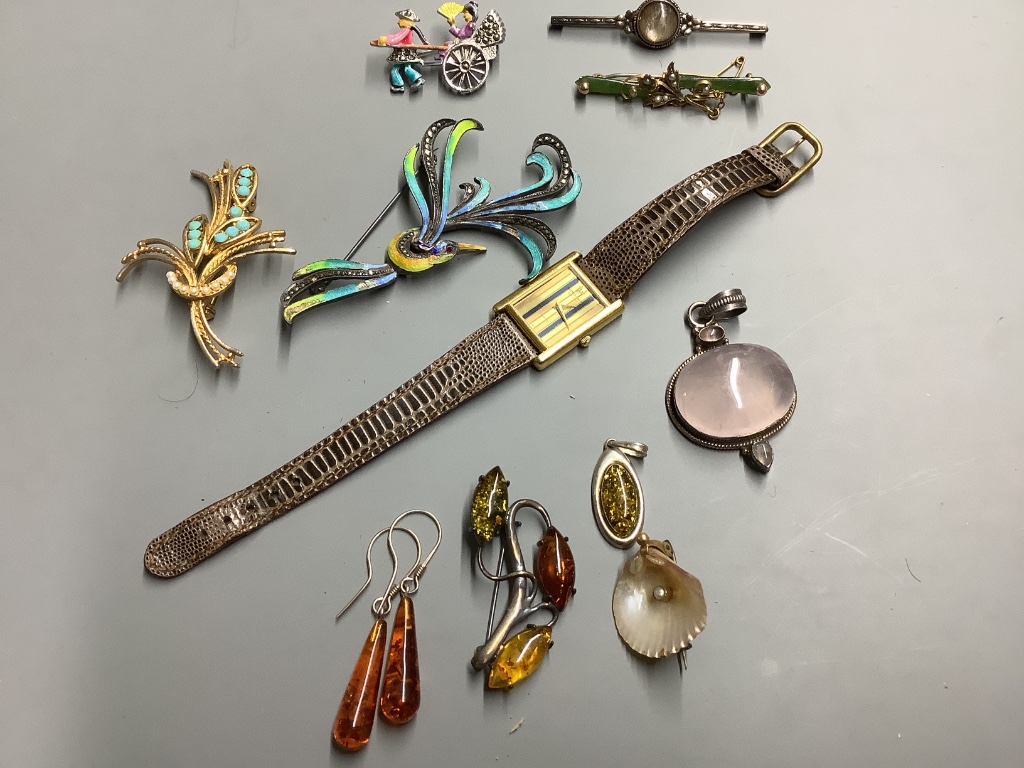 Assorted jewellery including a 9ct and gem set bar brooch, 925 and costume and a Raymond Weil gold plated watch.